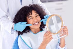 woman smiling after dental treatment