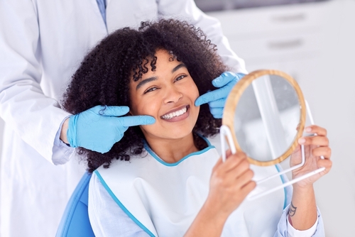 woman smiling after dental treatment