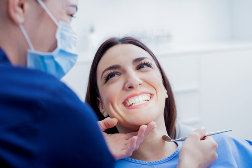 woman smiling at dentist